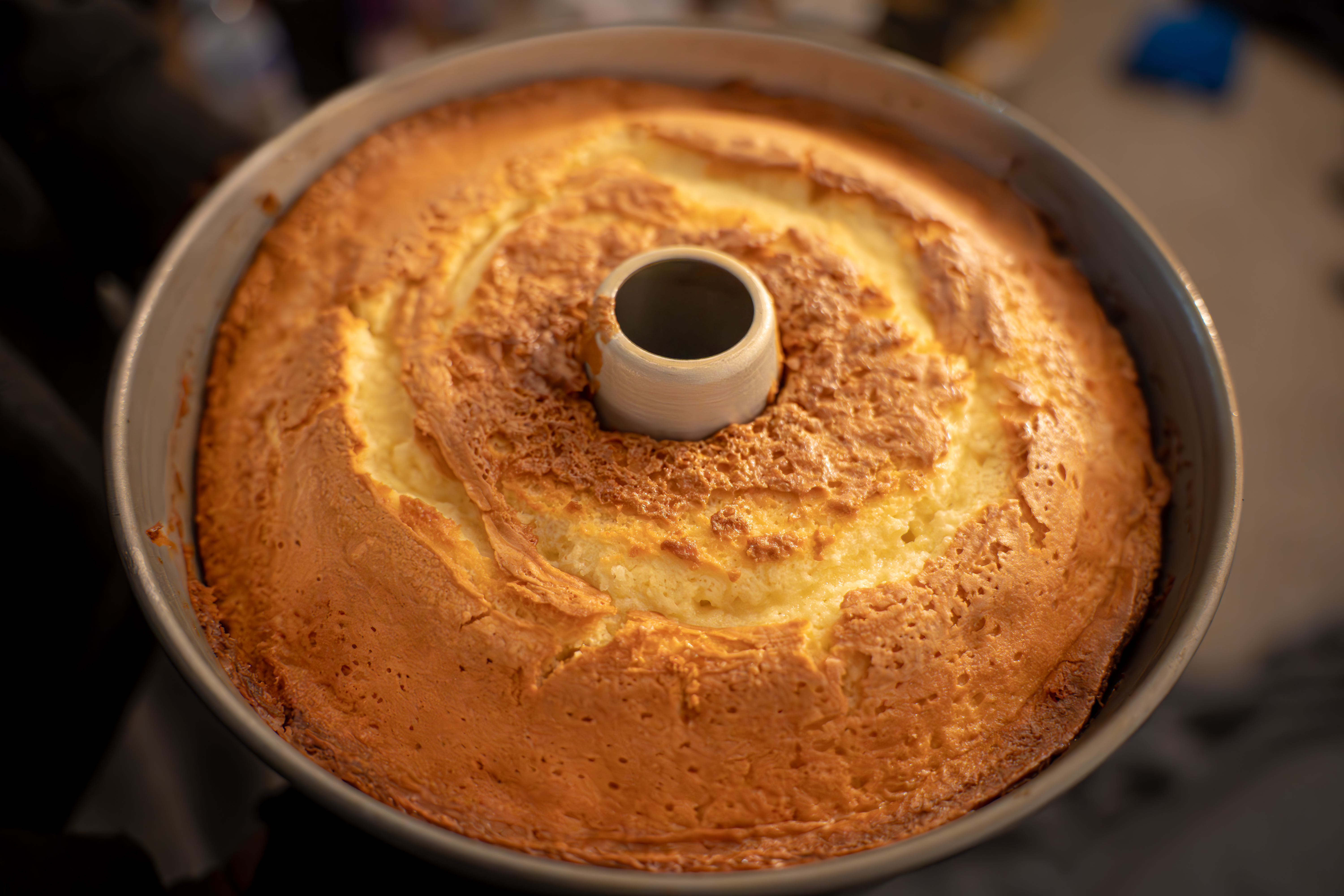 Freshly baked 7UP pound cake being held in the pan